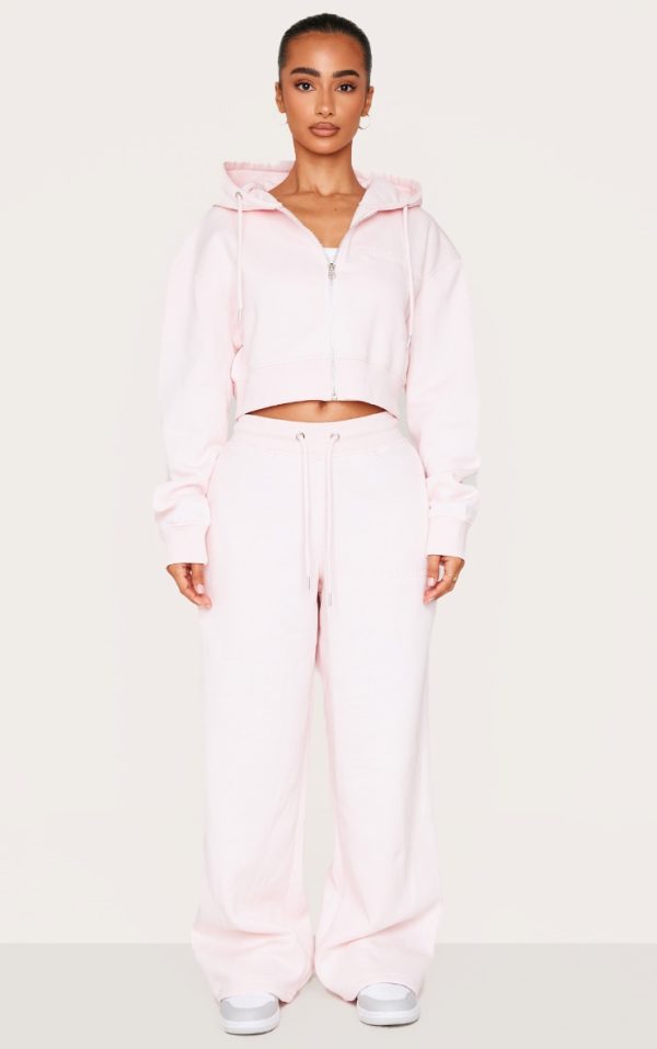 4357b99e96b15b87fb3052c638fcf8eb77a6492c_CNL2347_1_petite_baby_pink_tie_waist_embossed_detail_wide_leg_joggers