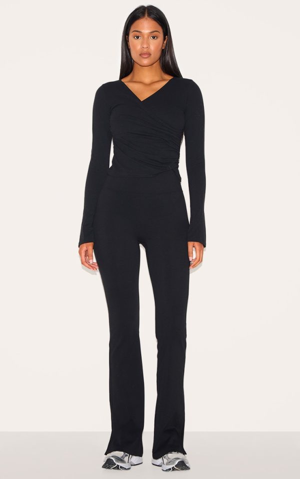 43f47c2f2f7a655414541d67737107b5038174d1_CNM1160_1_tall_black_contour_sculpt_seam_detail_flare_leggings