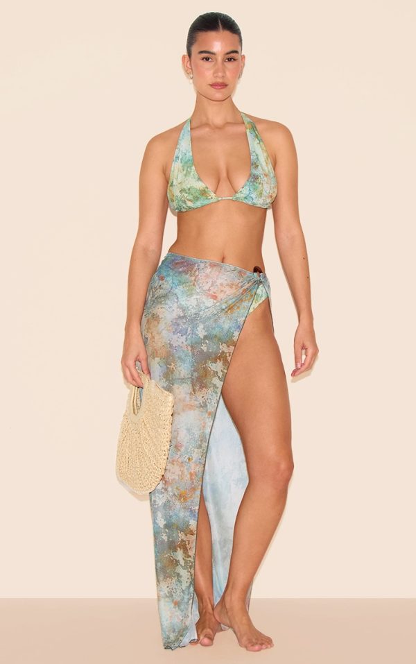 43fbfb9d799efc489008e989fc7c6653fab3700c_CNL5009_1_green_mottled_print_o_ring_detail_maxi_beach_skirt