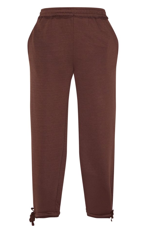 447669f770f327a1c5c21b6d577490c0d96ac6f5_CNM1974_5_shape_chocolate_highwaisted_back_slogan_joggers
