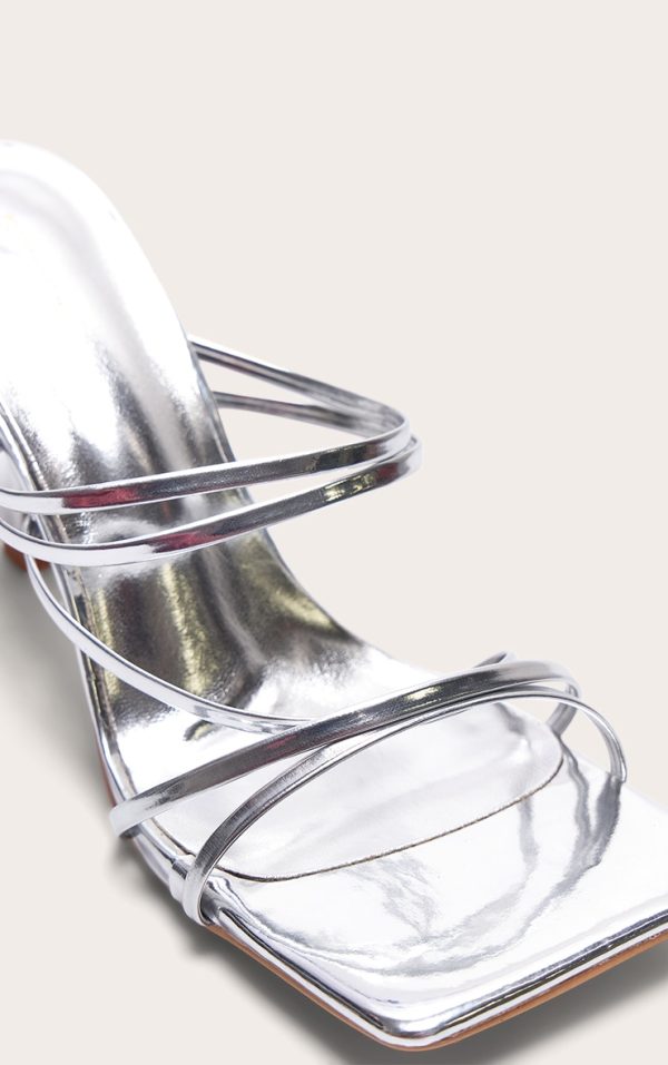 4479c5e27012c7b6d13c6e846e4ea0998b903b6e_CNE7948_4_silver_pu_square_toe_multi_cross_strap_detail_mid_heeled_mules