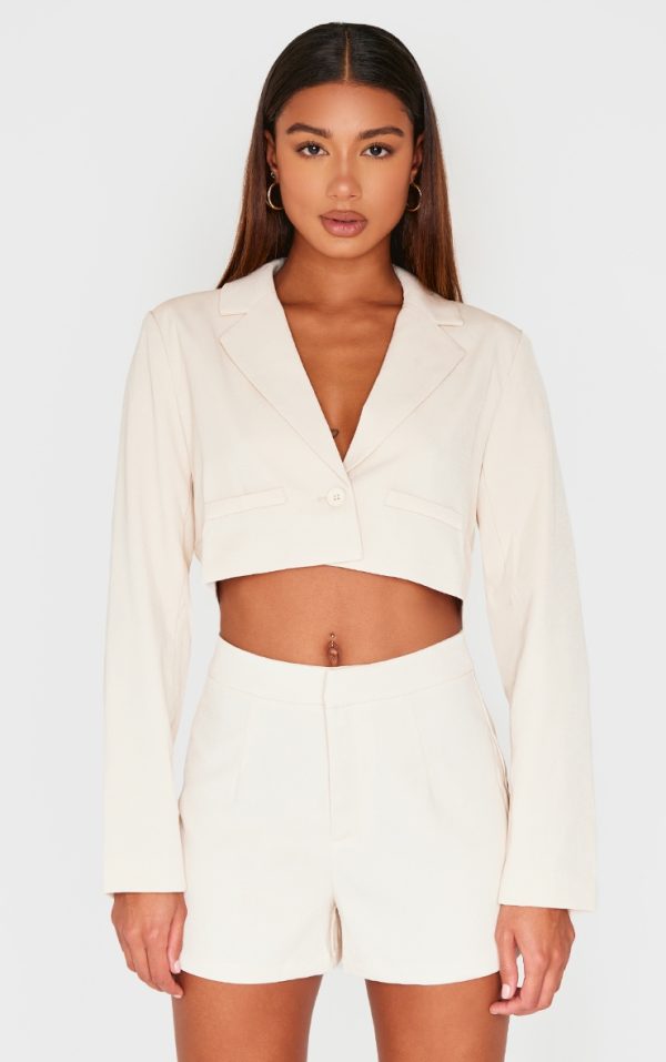 4499ce69a8b5d2b3a7562fb3b77f3383f26426c2_CNI4148_1_cream_tailored_cropped_pocket_detail_blazer