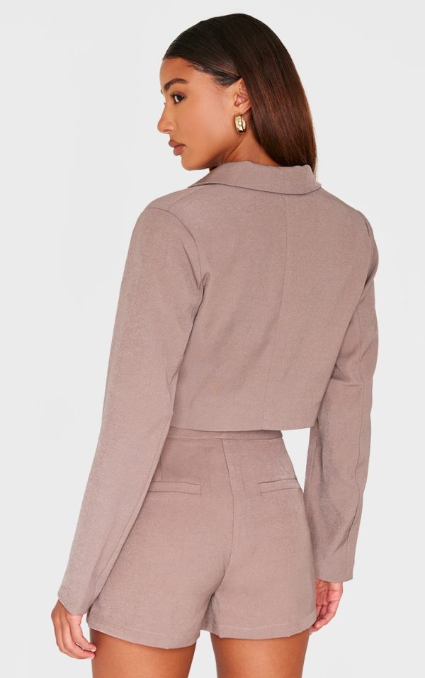44af4daabdbd4da9b24281b10534eaa6fab60943_CNI4147_2_mocha_tailored_cropped_pocket_detail_blazer