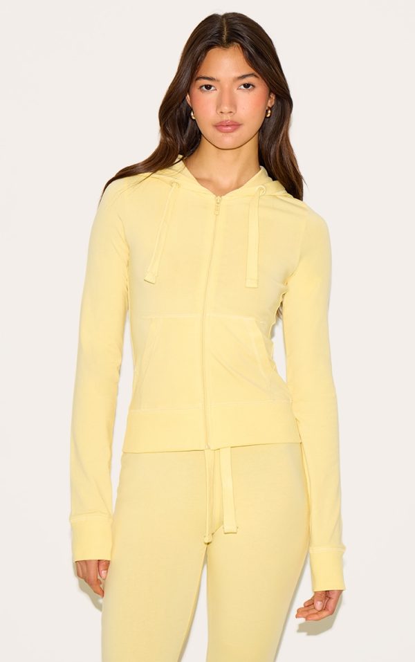 44bb051f6f9684722fb8725ebb4ae82393229cda_CNN0641_1_butter_yellow_zip_up_fitted_track_top