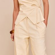 44ea41b86a7e12234f1b035279f76afa7fd56407_CNM6318_4_almond_textured_pleat_mid_rise_wide_leg_trousers