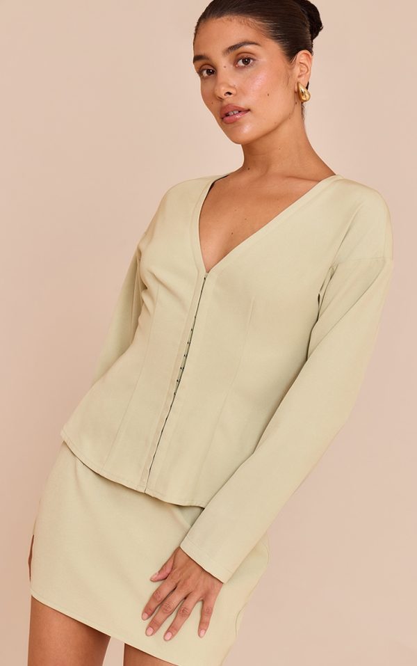 44fcb7ffb5332b3dcba97c4da23763edec1d62e7_CNM7000_4_petite_soft_olive_collarless_hook_and_eye_cinched_waist_long_top