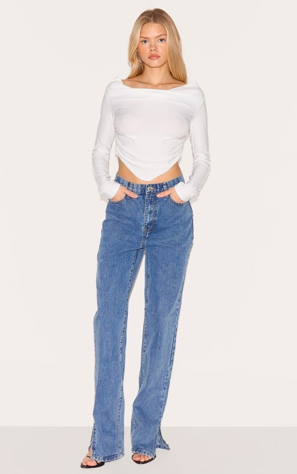 452c02e97f9dae24363c7034d91b34bae54ef7c9_CMM6580_1_vintage_wash_split_hem_jeans