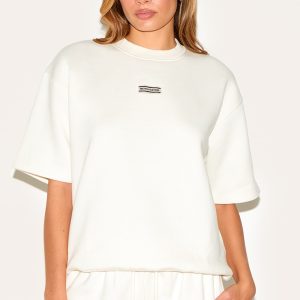 PRETTYLITTLETHING Cream Badge Detail Oversized Short Sleeve Sweatshirt