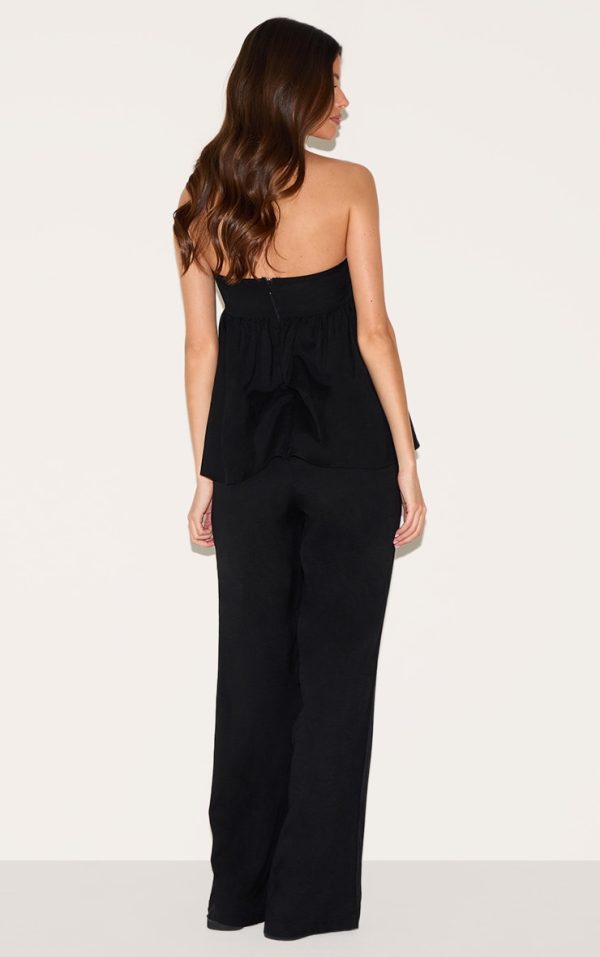 453fc4b2b9b92cc27012cbadb16836ae8b527ffc_CNM0436_2_black_bandeau_peplum_detail_jumpsuit-1