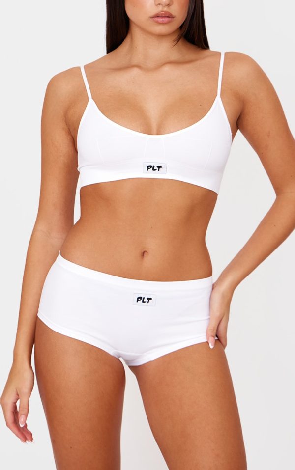 4597ff066c6904ac6a45b2fbc020755b1e587df9_CNK6348_1_prettylittlething_white_woven_badge_seamless_brief