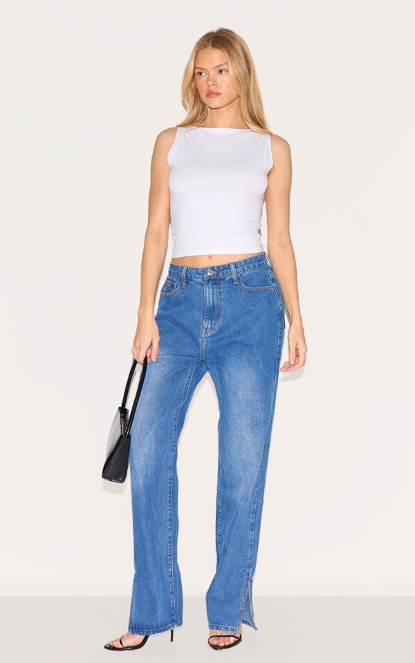 463354e716c59f0351a634bb016c273824bb33ba_CMU3593_1_mid_blue_wash_l30_denim_split_hem_jeans