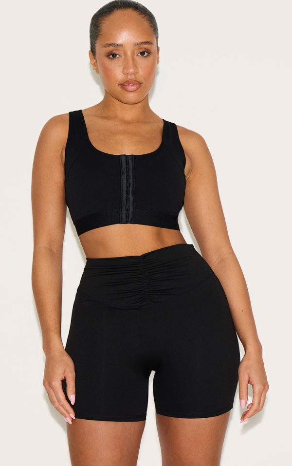 464d1621d5806b1572f975488fe3a322c4d6c366_CNM2607_4_shape_black_active_hook_and_eye_front_support_strap_padded_sports_bra