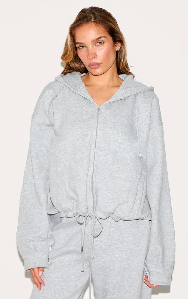 46e31670920df939ef3ced5a11d85762015aeee6_CNL8047_1_grey_oversized_zip_up_toggle_waist_hoodie