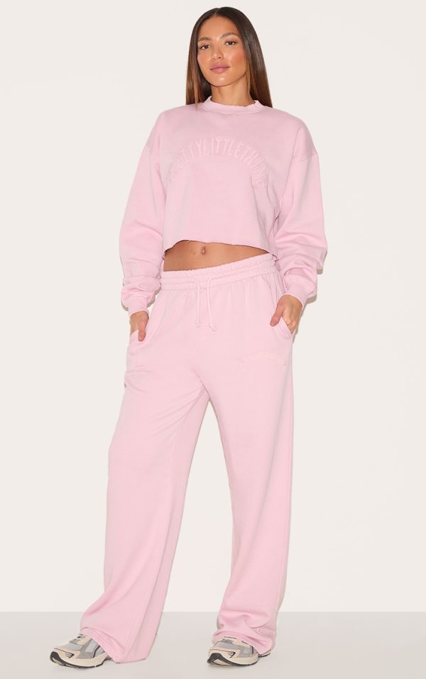474ba08ed0bbf4c341c70bb168a28e3e522a9948_CNJ8961_1_prettylittlething_tall_washed_pink_extreme_oversized_drawstring_wide_leg_joggers