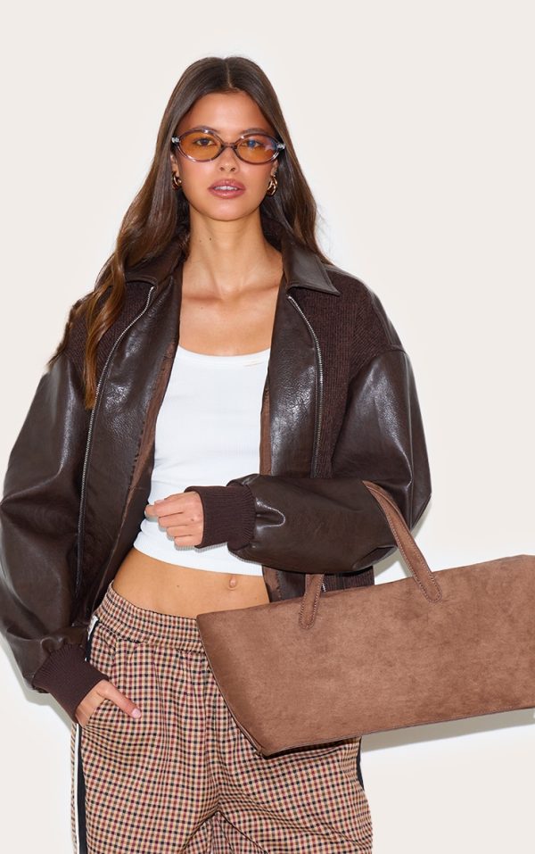 4773aa2382df4593754f04389242c4aeea0ad863_CNL9835_5_chocolate_faux_suede_elongated_hand_bag