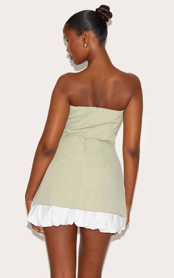 479fc05e993af3cd5c4e0af17b62d96890138bb6_CNL9038_2_sage_green_tailored_bandeau_puffball_hem_shift_dress