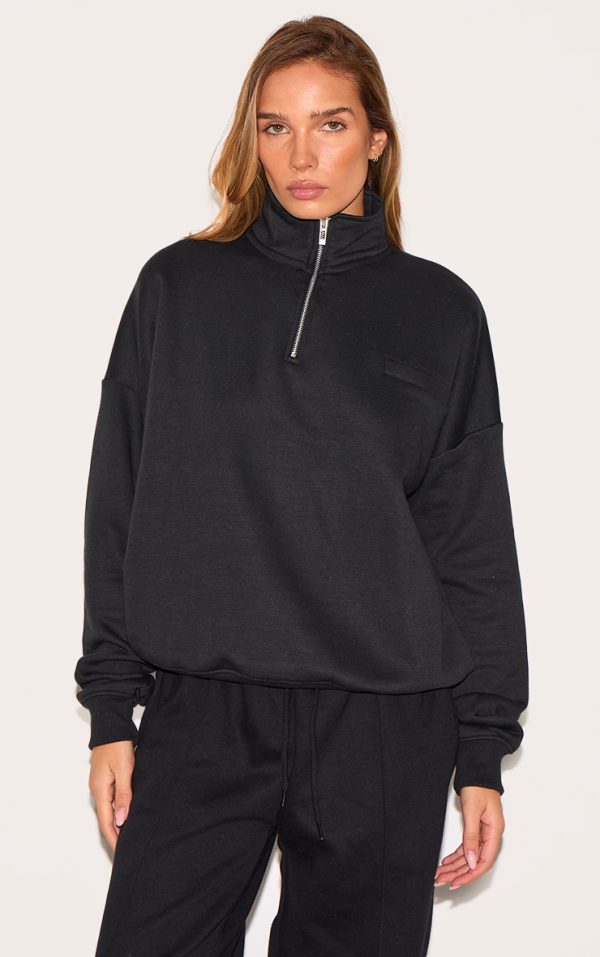 4805c54609a6749477c61e19aaff737f1e1190a8_CNL9654_1_black_oversized_quarter_zip_sweat_top