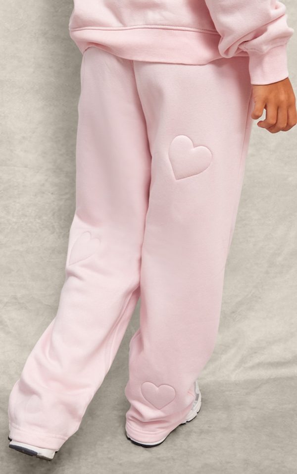 48d67c577c4750403d3aac7aae74c6a611d39df5_CNJ8739_3_baby_pink_embossed_heart_wide_leg_joggers