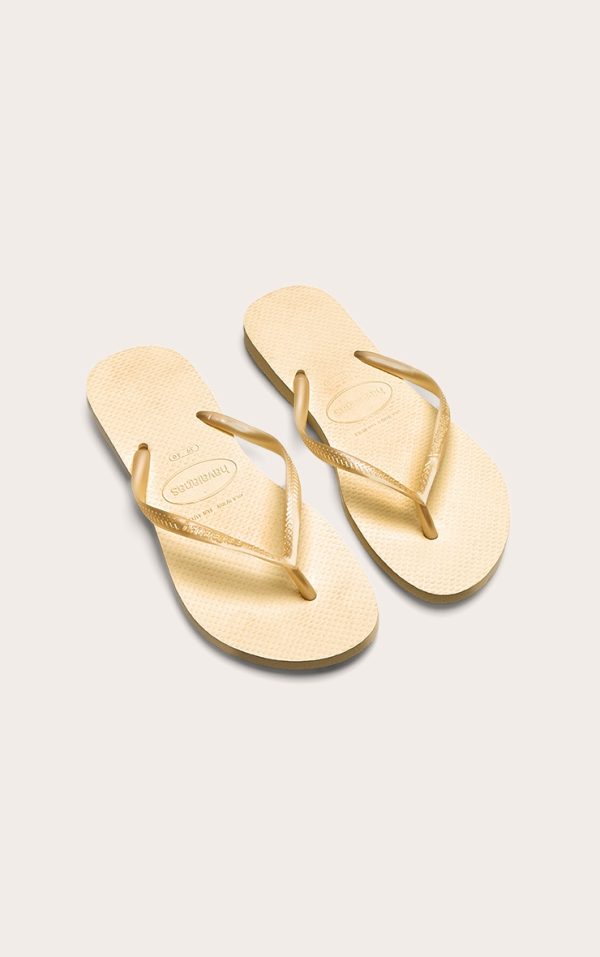 49e9c9c441b5177b51f0fad0eb812130fcc0fd93_CNM1897_2_butter_yellow_havaianas_slim_flip_flops