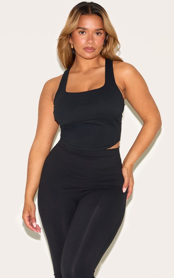 4a202fa47ddf41c9193a92d0d0586015e86c1a08_CNM6292_1_shape_black_active_cupped_seam_detail_sports_bra