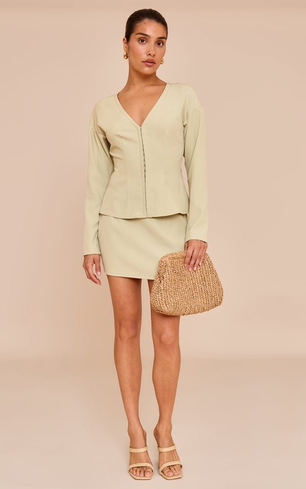 4a5f2eacea07ecf25bfa2c89bcb7049d2298e0d3_CNM7001_1_petite_soft_olive_mid_rise_mini_skirt
