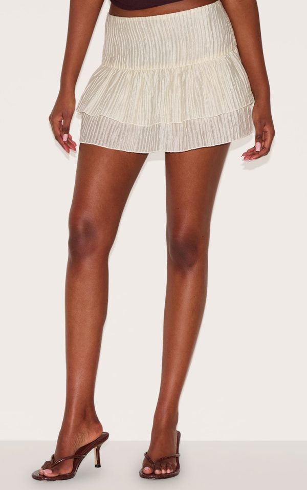 4a63b2a042dfebe0745d802e08e58d158a5722b5_CNL9322_2_almond_crinkle_woven_dropped_waist_frilly_mini_skirt