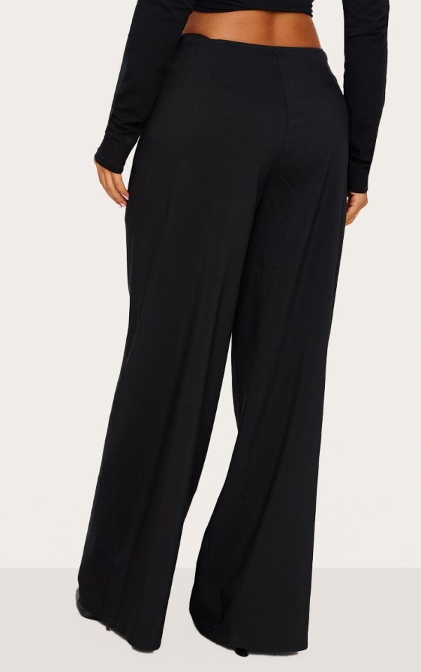 4aa846b29d66087ba2b94dccdb6370d9d68ca082_CNL5524_3_petite_black_low_rise_cut_out_buckle_detail_wide_leg_trousers