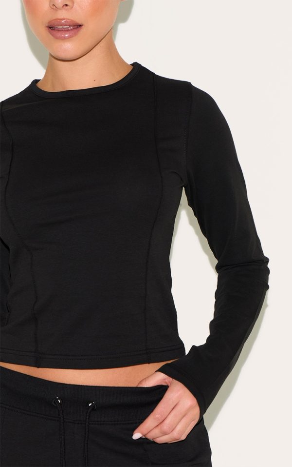 4bfdfd6db29a00d7454978c231081d6e52a8bc3b_CNM2915_4_black_cotton_seam_detail_long_sleeve_top