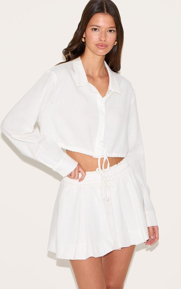 4c0f4b709f5c05c39901a6b280f077899fa293ac_CNM2101_1_white_drawstring_puff_ball_skirt