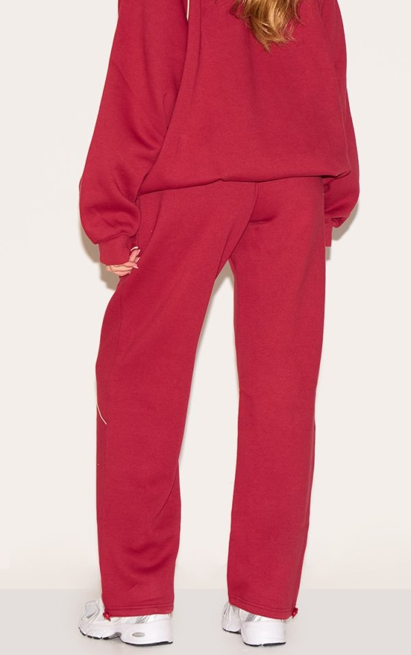 4c36ddb10d7dccbf968deb5fc46d9eb7c944d67b_CNM4813_3_red_oversized_contrast_piping_straight_leg_joggers