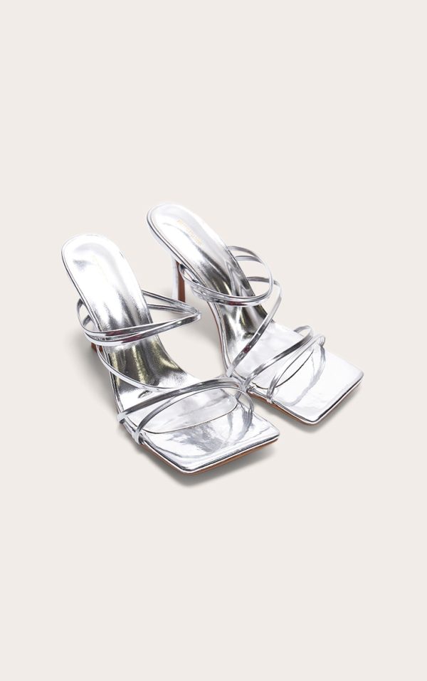 4ca31bbf3791aefdf8a48c7e27470b6214eb3654_CNE7948_2_silver_pu_square_toe_multi_cross_strap_detail_mid_heeled_mules