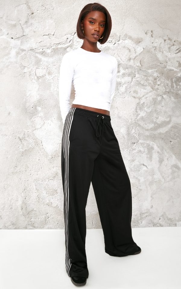 4d1f177811e44acecce96e548775baa130dafbc3_CNK7321_1_tall_black_tricot_side_stripe_wide_leg_joggers