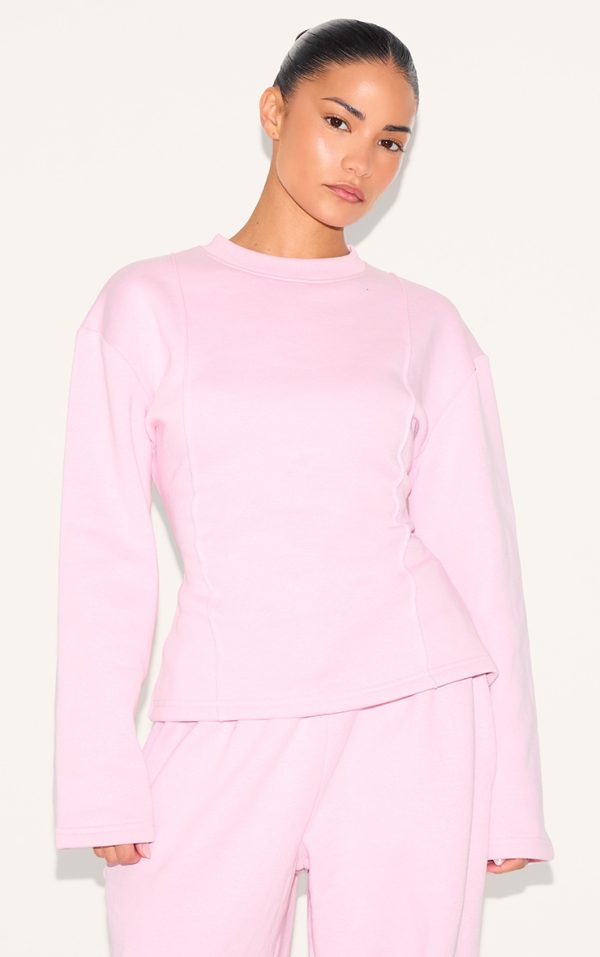 4d404d30c99827ed6cb0911579657ec9a4d0e971_CNM7251_1_petite_baby_pink_long_sleeve_waist_cinched_sweatshirt