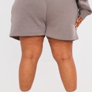 4d5a082ef103c8f5f41d0243d275dffc6eb5d4cb_CNI4892_3_prettylittlething_plus_charcoal_logo_oversized_sweat_shorts