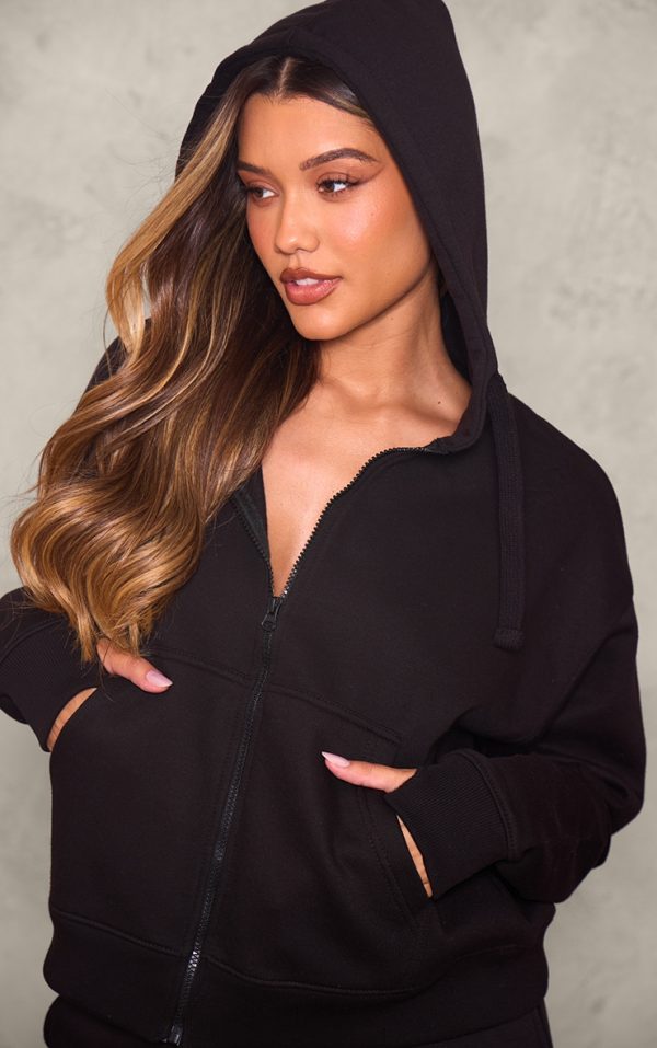 4dfd4517605114811acde8447fe69ba107e48f6b_CNJ6645_1_black_oversized_hooded_zip_up_sweat