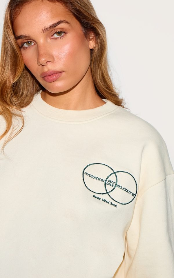 4e29a8e907c59c09ee5bc956c55771dd02279be1_CNL8276_4_cream_circle_wellness_premium_print_oversized_sweatshirt
