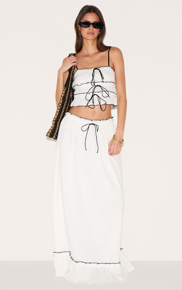 4e848ce7342b764a20574bdd80ebda975d52f490_CNM3939_1_white_cheesecloth_contrast_maxi_skirt