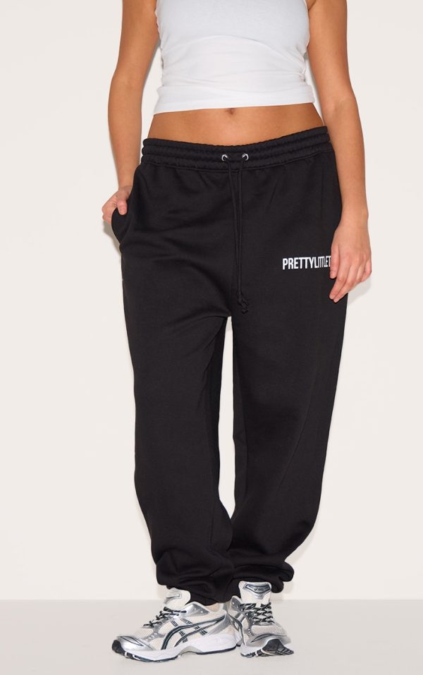 4eca581223ab68dd1b361fc660eb7f99a97b6164_CNL9475_2_prettylittlething_plus_deep_black_high_waisted_cuffed_joggers
