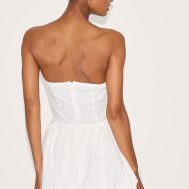 4ee135af26a59398c0658cea6d6c32974144710d_CNL8932_2_white_linen_bandeau_tie_waist_puffball_dress-1