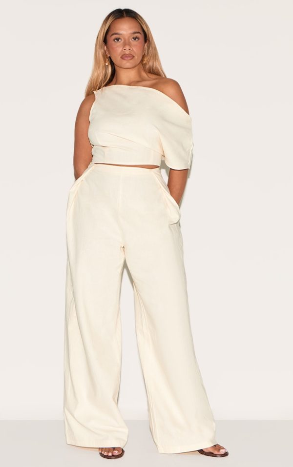 4f0605f16376dcb2f43e9380081c561694d7d2c4_CNM6339_3_shape_cream_linen_asymetrical_off_the_shoulder_top