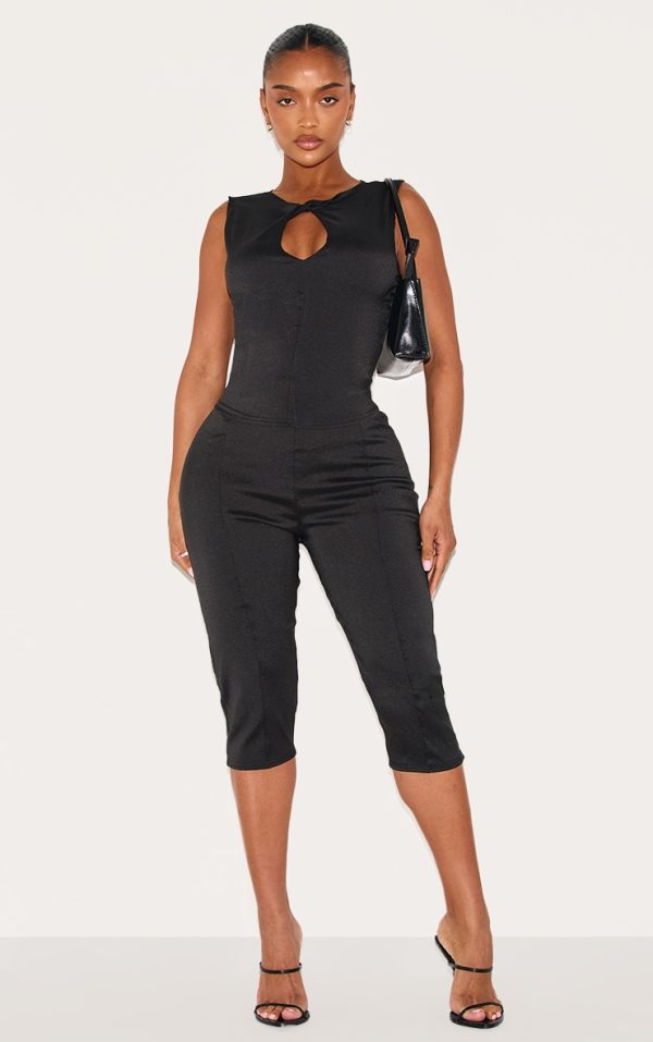 4f16d0272f8623702fdfc60a01bbd41ae314bda2_CNM2077_1_shape_black_stretch_woven_pintuck_capri_pants