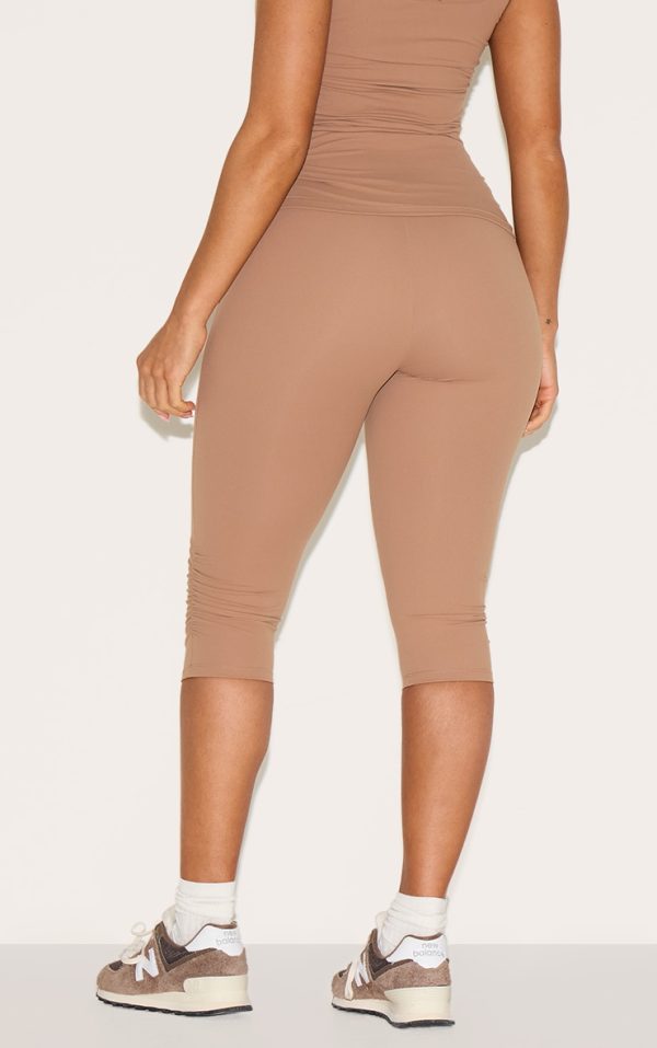 4f6019a671485210fa98f68cdf4ee0e59d1f9298_CNM0984_3_shape_taupe_active_ruched_side_high_waisted_capri_pants