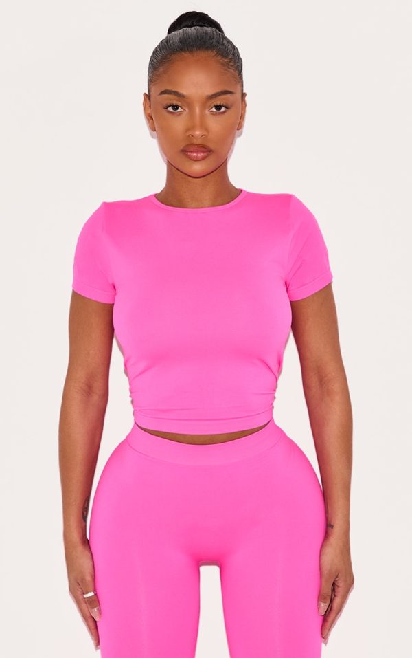 4f65299c275fa80d0e7e3567448776db483af300_CNI7915_1_shape_neon_pink_stretch_seamless_short_sleeve_longline_top