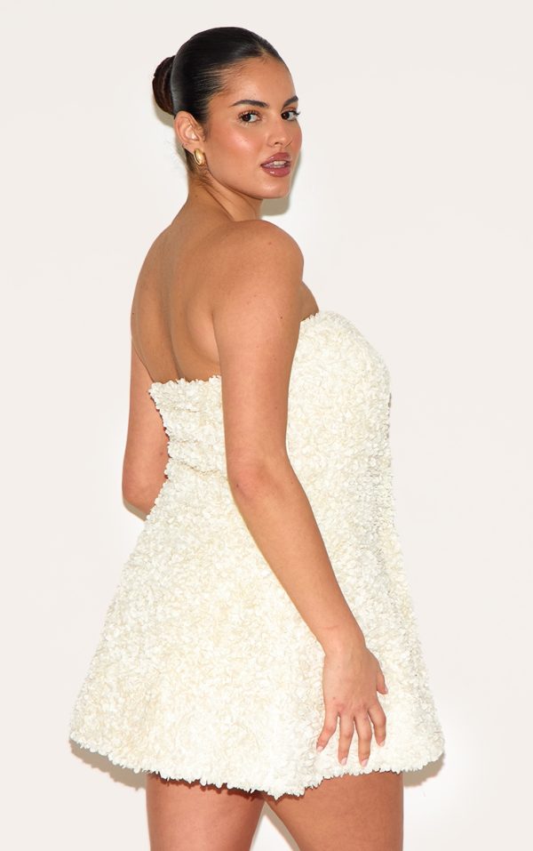 4fdeea2074ae67e24221f557c80536935feb92c2_CNM2034_2_plus_cream_floral_textured_bandeau_mini_dress