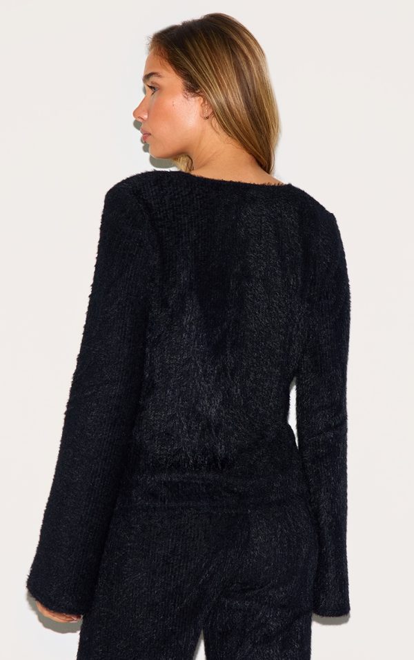 50502e2d7873a815c21800a2efd3a70f5715533c_CNM2121_2_black_textured_v_neck_button_cardigan-1