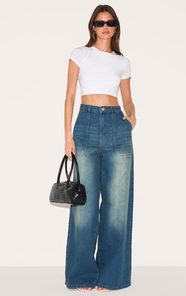 50a519fb8595464f055c1d1f45cbfd90423798bb_CNL2359_1_vintage_wash_mid_rise_wide_leg_style_jeans