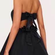 50f21b3529bc917edaf2e42399ae799101d8b211_CNL4664_4_black_satin_bandeau_bow_back_shift_dress