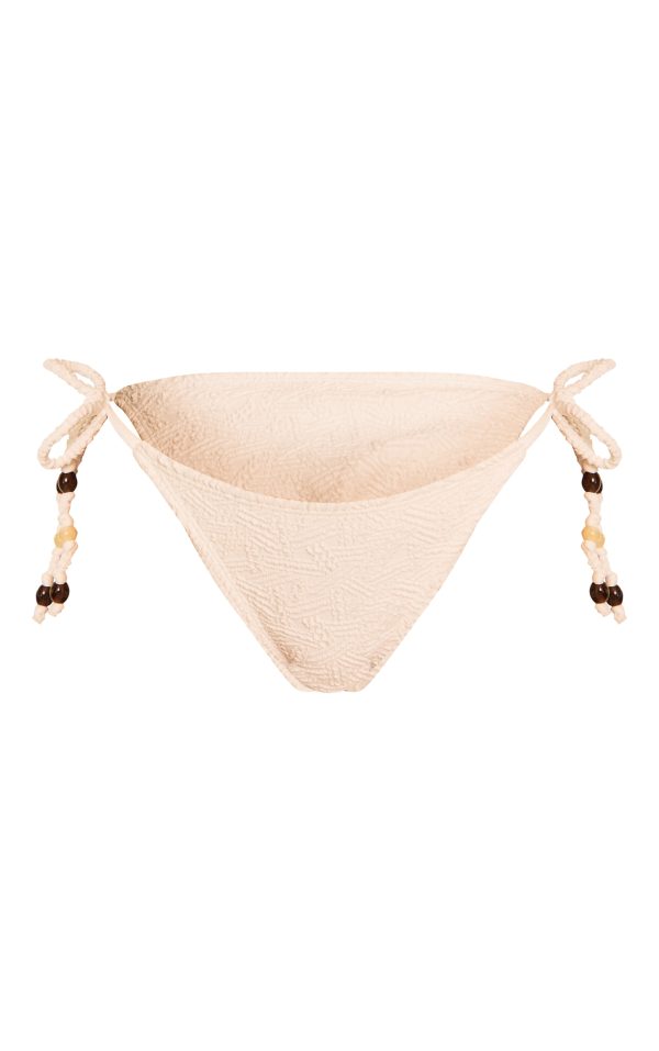 5179231dd7f1577bf30e836057e3b07a566e421b_CNM6709_5_white_textured_bead_trim_tie_side_bikini_bottoms