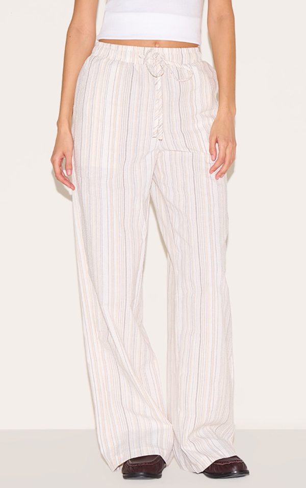 51b5d6697b40cc73bf0716be4ddafecb40cb5d8a_CNL9332_2_beige_pinstripe_printed_drawstring_waist_slouchy_trousers