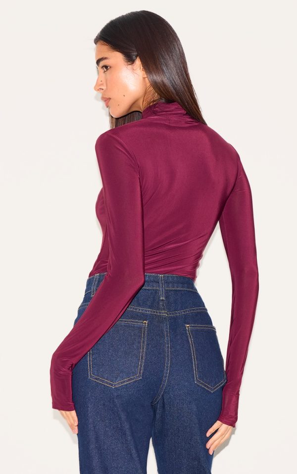 52d7e813020636ac239949d6fef909354df97f33_CNM1401_2_plum_slinky_high_neck_thumb_detail_long_sleeve_top